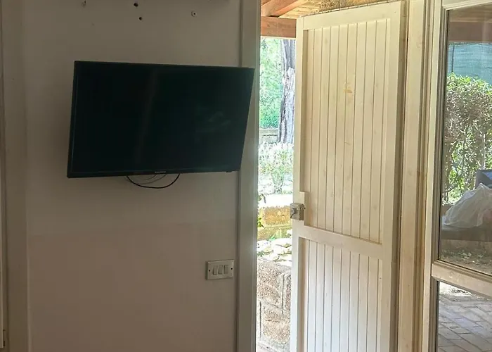 Апартаменты Villaggio Capopiccolo